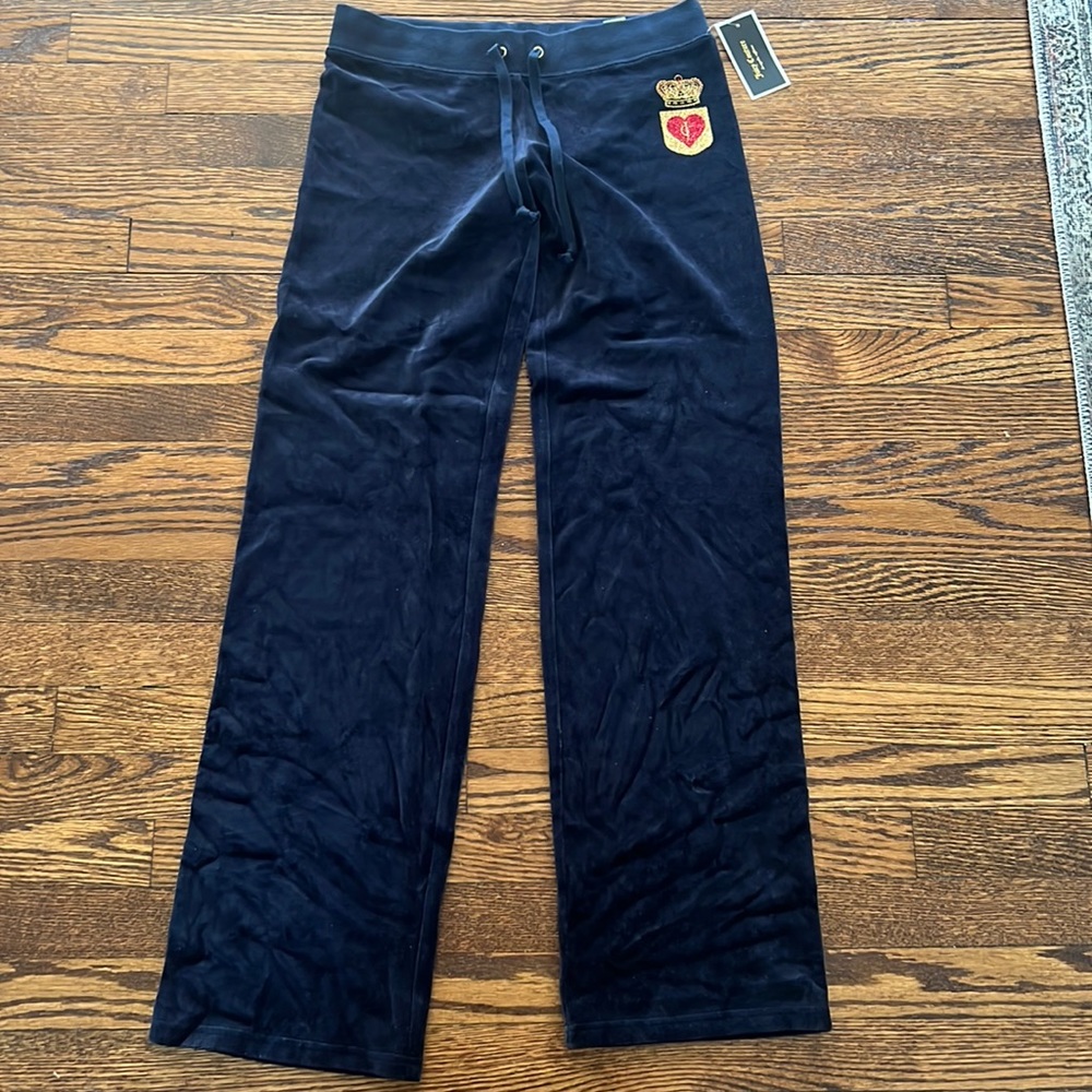 Navy blue Juicy velour pants with gold emblem